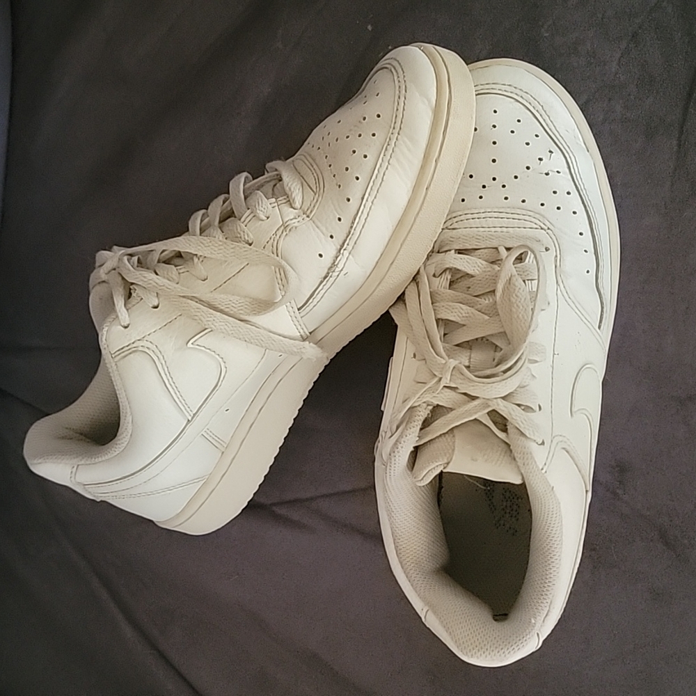 NIKE sneakers.
